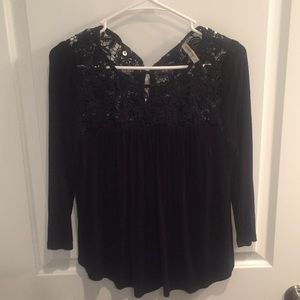 Cute black top with islet detail.